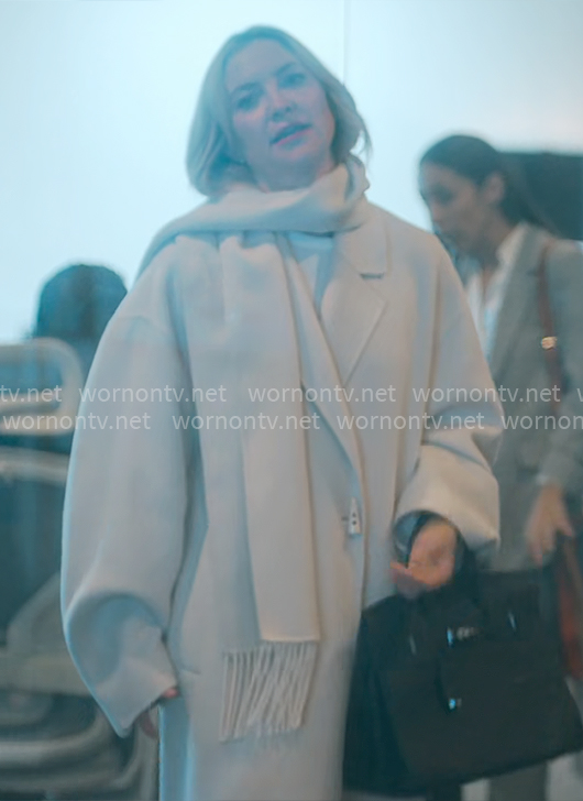 Isla’s ivory scarf coat on Running Point