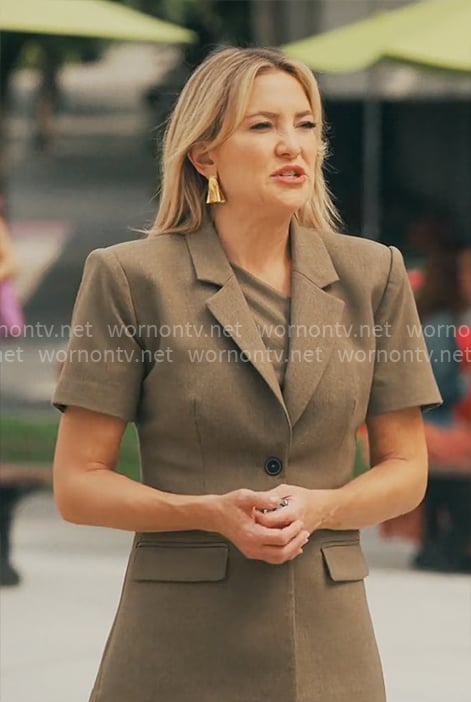 Isla’s olive suit with one shoulder top on Running Point