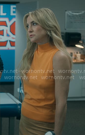 Isla’s orange sleeveless knit top on Running Point