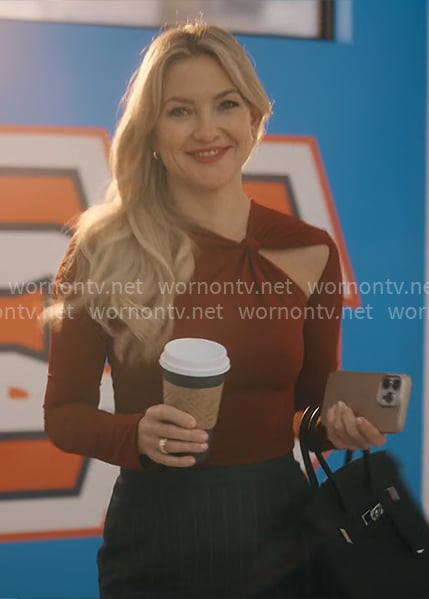 Isla’s red long sleeved top with cutout on Running Point