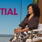 Judy Reyes’s brown blouse and ivory floral skirt on Good Morning America