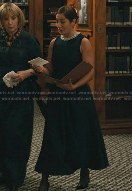 Jules’ black embellished neckline dress on Elsbeth