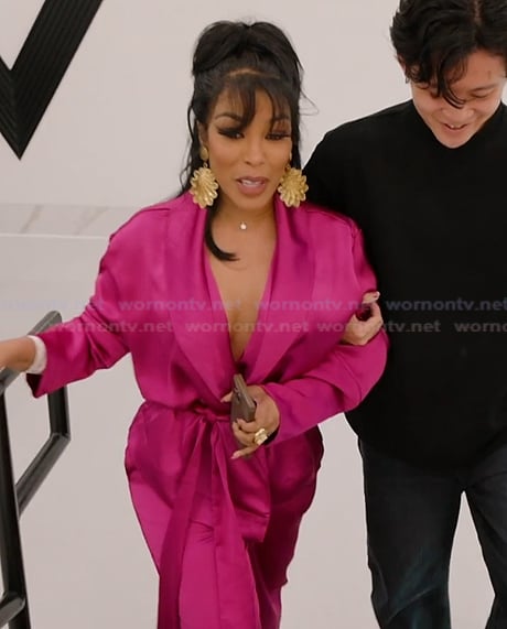 K’s pink satin wrap top and pants on The Real Housewives of Atlanta