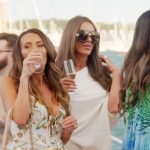 Liz’s white one shoulder jumpsuit on The Real Housewives of Rhode Island