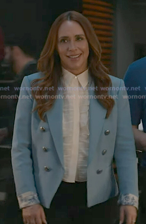 Maddie’s white ruffle front top and blue blazer on 9-1-1