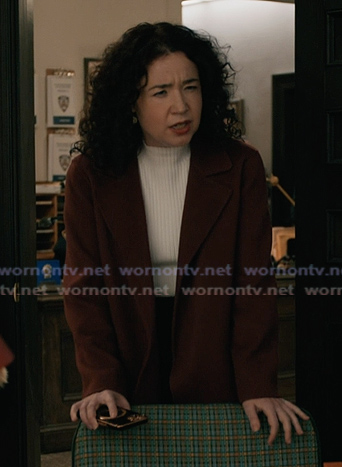 Marisa’s burgundy blazer on Elsbeth