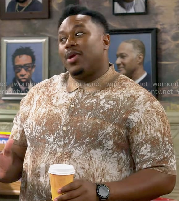 Marty’s brown printed polo shirt on The Neighborhood