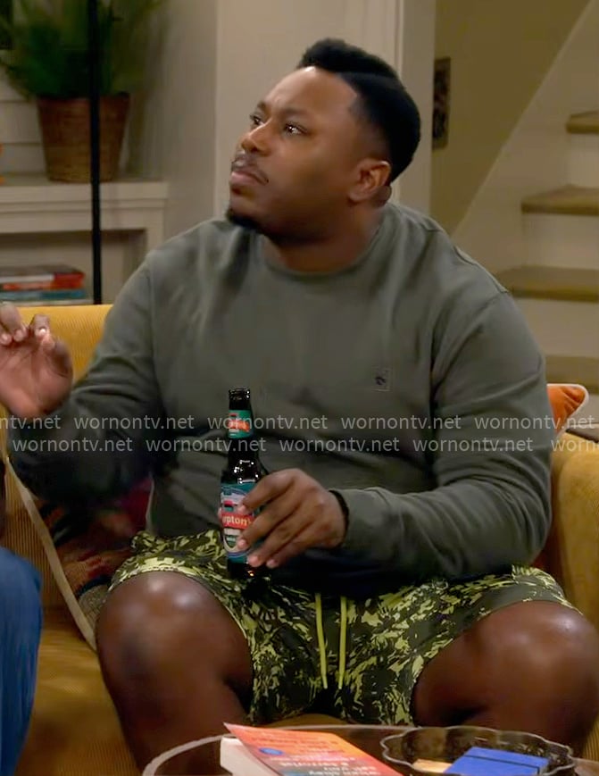 Marty’s olive green sweatshirt on The Neighborhood