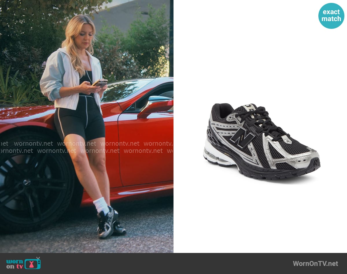 New Balance 1906R Running Shoe in Black / Dark Silver Metallic worn by Isla Gordon (Kate Hudson) on Running Point