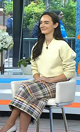 Olivia Perez’s yellow v-neck sweater and plaid skirt on Today