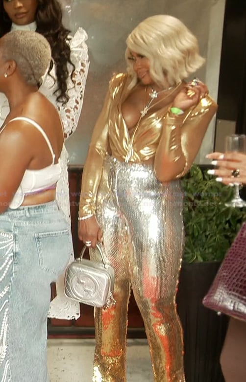 Phaedra’s metallic jeans and bodysuit on The Real Housewives of Atlanta