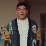 Q’s gray distressed printed cardigan on XO Kitty