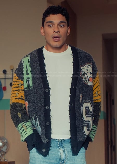 Q’s gray distressed printed cardigan on XO Kitty