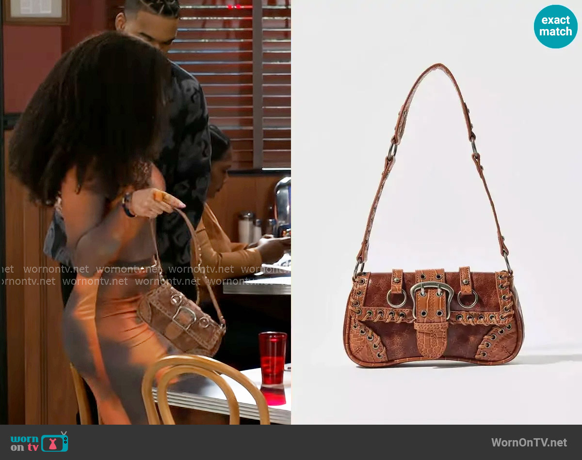 Silence + Noise Jade Laced Rivet Bag worn by Eva Thomas (Ambyr Michelle) on Beyond the Gates