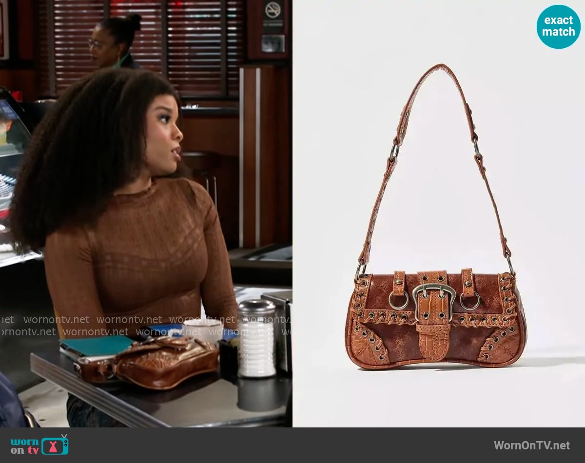 Silence + Noise Jade Laced Rivet Bag worn by Eva Thomas (Ambyr Michelle) on Beyond the Gates