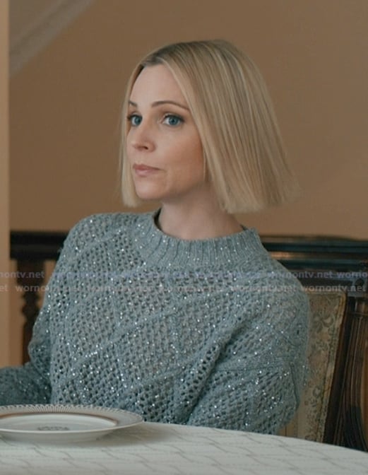 Sloan’s gray cableknit sweater on Elsbeth