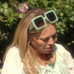 Sutton’s mint green embroidered blouse on The Real Housewives of Beverly Hills