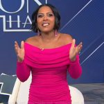Tamron’s pink off shoulder dress on Tamron Hall Show