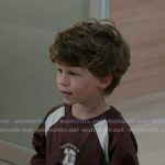 Theo’s burgundy print long sleeve tee on 9-1-1