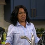 Tina’s blue striped shirt on The Neighborhood