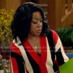 Tina’s red striped cardigan on The Neighborhood