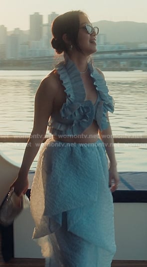 Yuri’s blue textured asymmetric skirt on XO Kitty