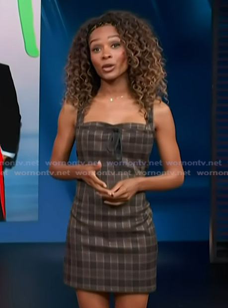 Zuri’s brown check print dress on Access Hollywood
