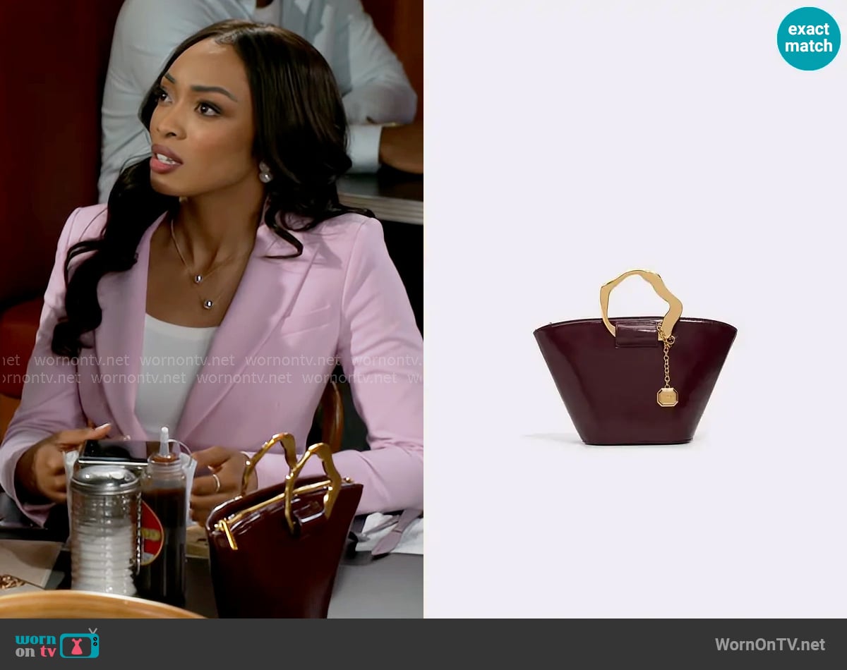 Aldo Goldenview Bag worn by Madison Montgomery (Kenjah) on Beyond the Gates