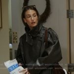 Amanda's black leather jacket on In The City