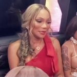 Angela’s red tie shoulder dress on The Real Housewives of Atlanta