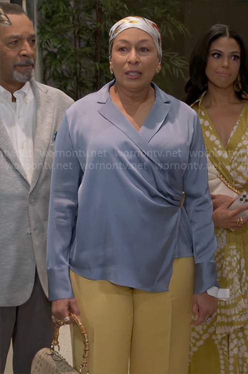 Anita’s blue wrap blouse on Beyond the Gates