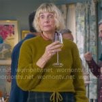 Anne's olive tie hem sweater and checked pants on The Four Seasons