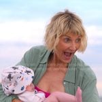 Anne's striped swimsuit and long green shirt on The Four Seasons