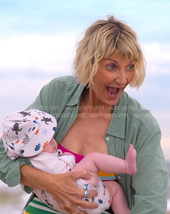Anne’s striped swimsuit and long green shirt on The Four Seasons
