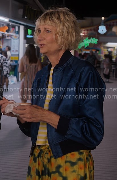 Anne’s yellow striped top, blue bomber jacket, and floral pants on The Four Seasons