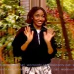 Ayo Edebiri’s black half-zip sweater and asymmetric skirt on The View