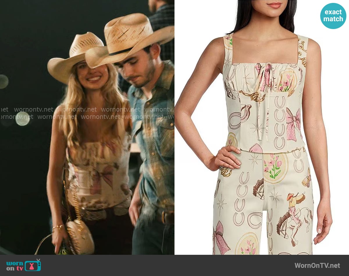 Cassie’s bow print top on Dutton Ranch