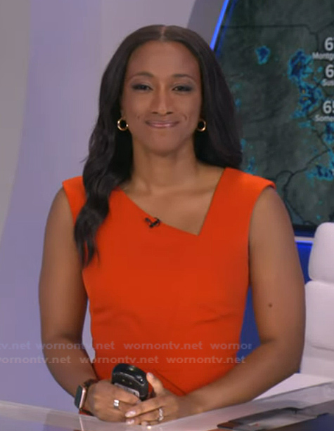 Brittany’s orange asymmetric neck dress on Good Morning America