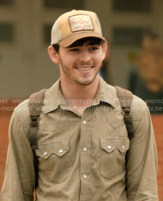 Carter’s khaki button down shirt on Dutton Ranch