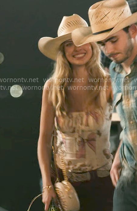 Cassie’s bow print top on Dutton Ranch