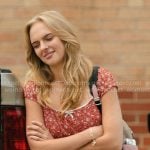 Cassie’s red floral top, belt and backpack on Dutton Ranch