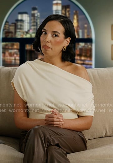 Danielle’s ivory off-shoulder confessional top on In The City