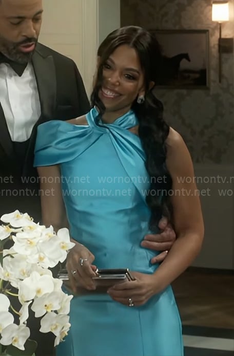 Dani’s blue twist-neck gown on Beyond the Gates