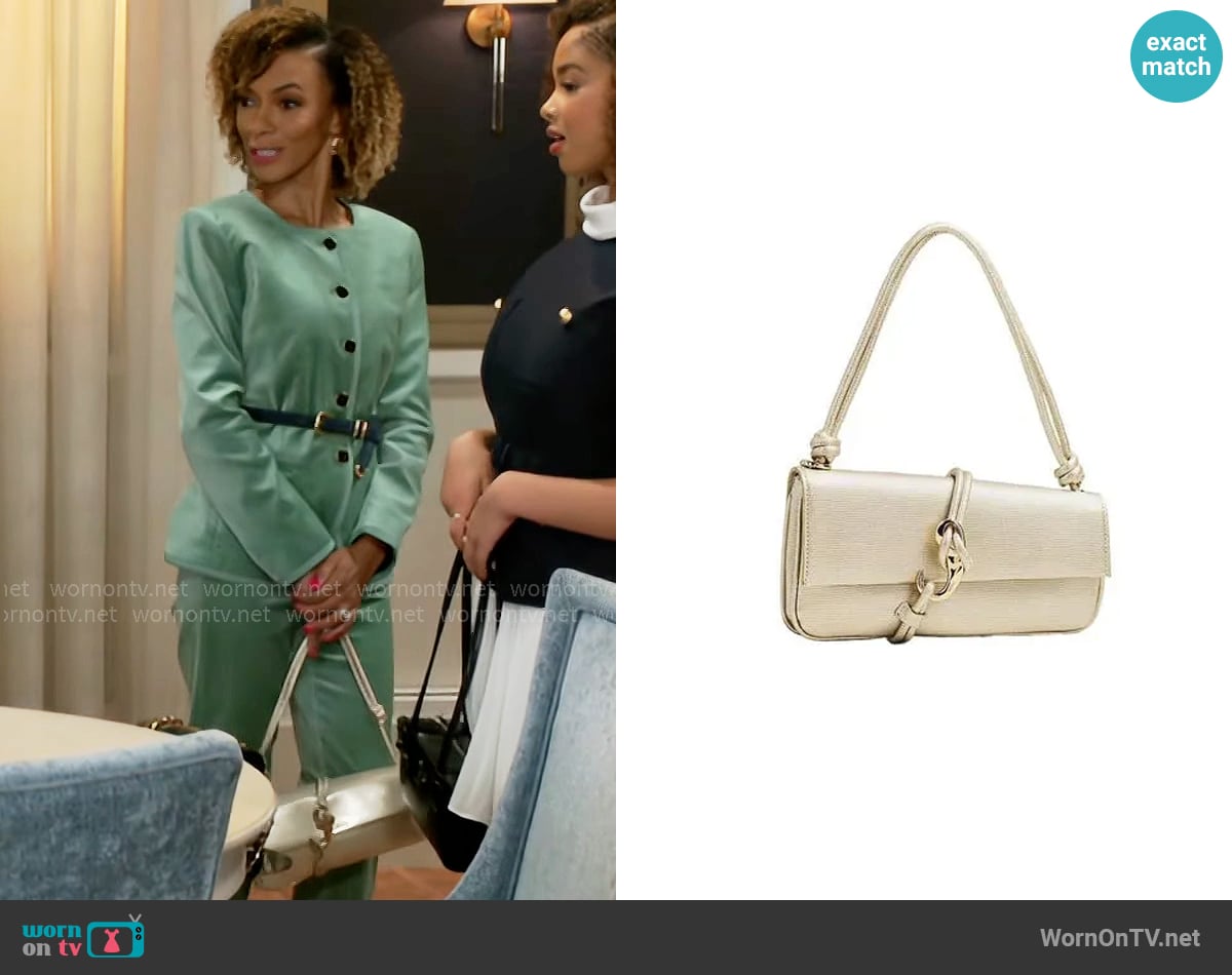 Dolce Vita Alice Bag worn by Anastasia Belleclaire (Timeca Seretti) on Beyond the Gates