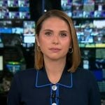 Elizabeth's navy contrast trim cardigan on Good Morning America