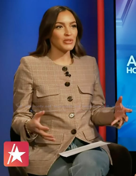 Emily’s plaid jacket on Access Hollywood