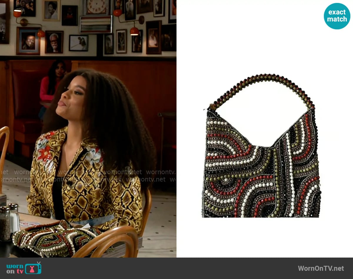 From India To You Beaded Hobo Bag worn by Eva Thomas (Ambyr Michelle) on Beyond the Gates