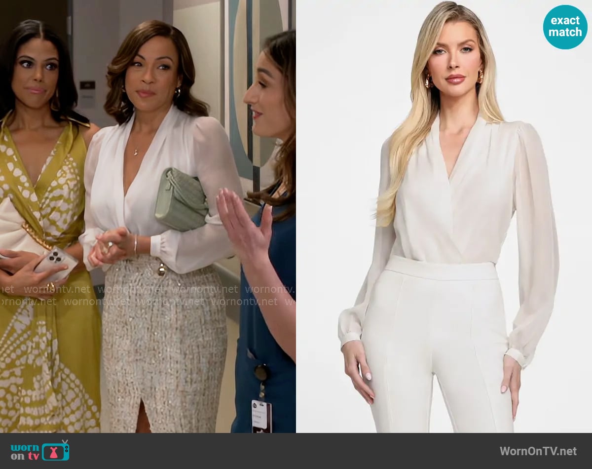 Nicole’s white blouse on Beyond the Gates Nicole’s white blouse on Beyond the Gates
