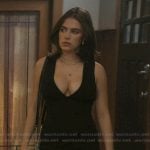 Hannah’s black plunging mini dress on Off Campus