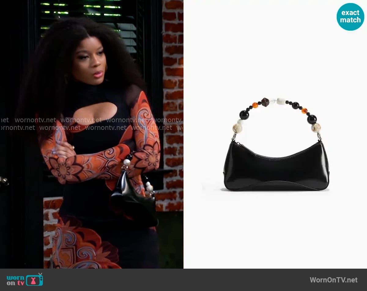 H&M Beaded-Strap Shoulder Bag worn by Eva Thomas (Ambyr Michelle) on Beyond the Gates